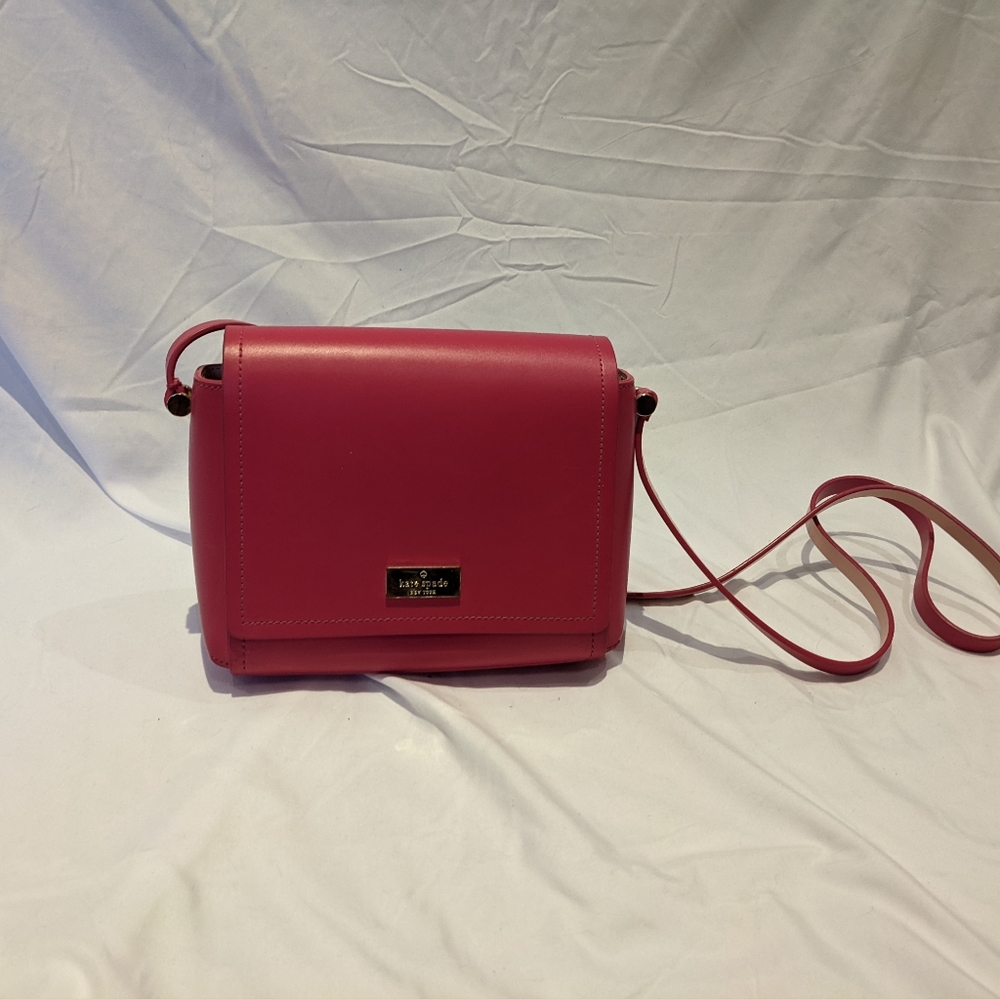 Hot pink Kate Spade purse.